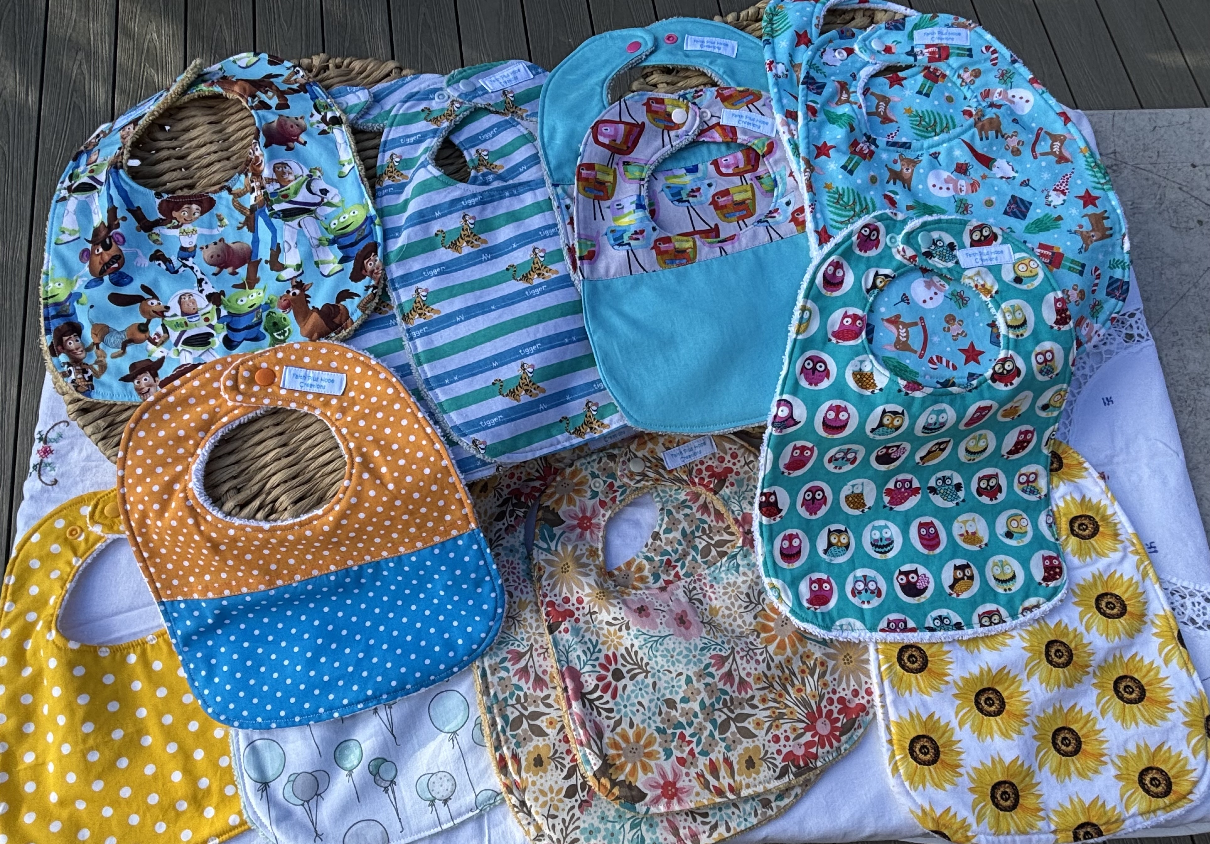 Handmade baby bibs by Faith Plus Hope Creations